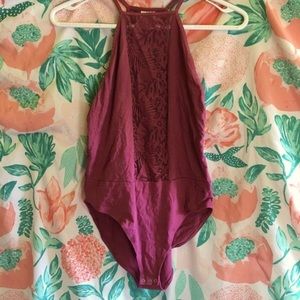 Purple lace bodysuit VS